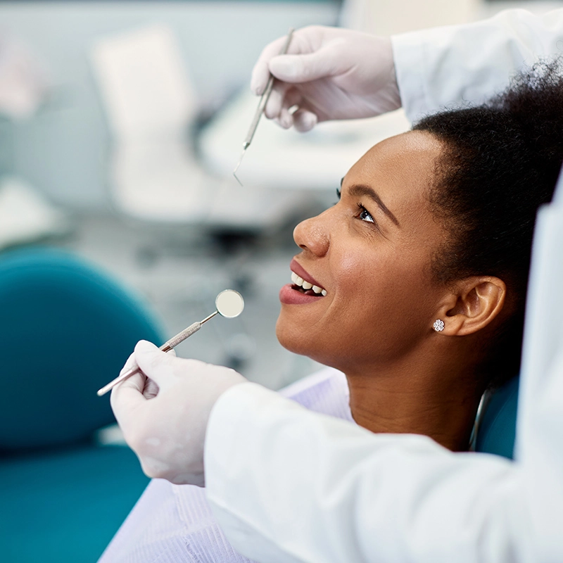 An image of a lady undergoing a dental exam