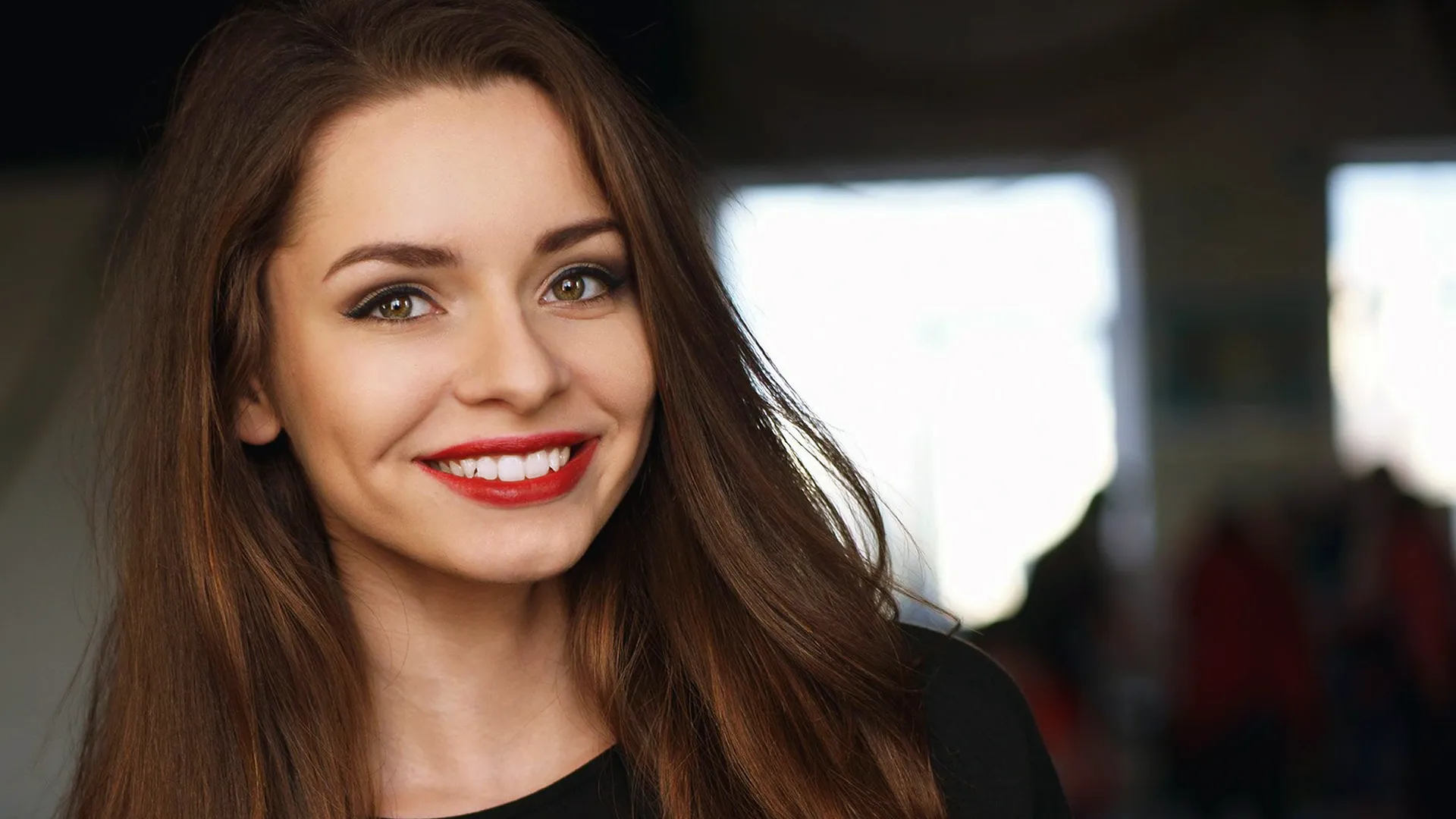 An image of a woman smiling