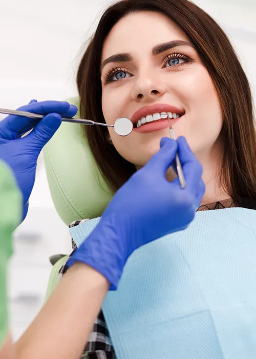 Patient being checked by dentist