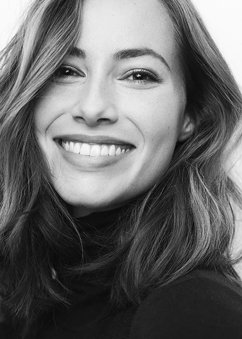 black and white image of lady smiling