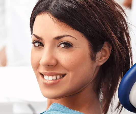 Hopeful root canal patient in dental chair